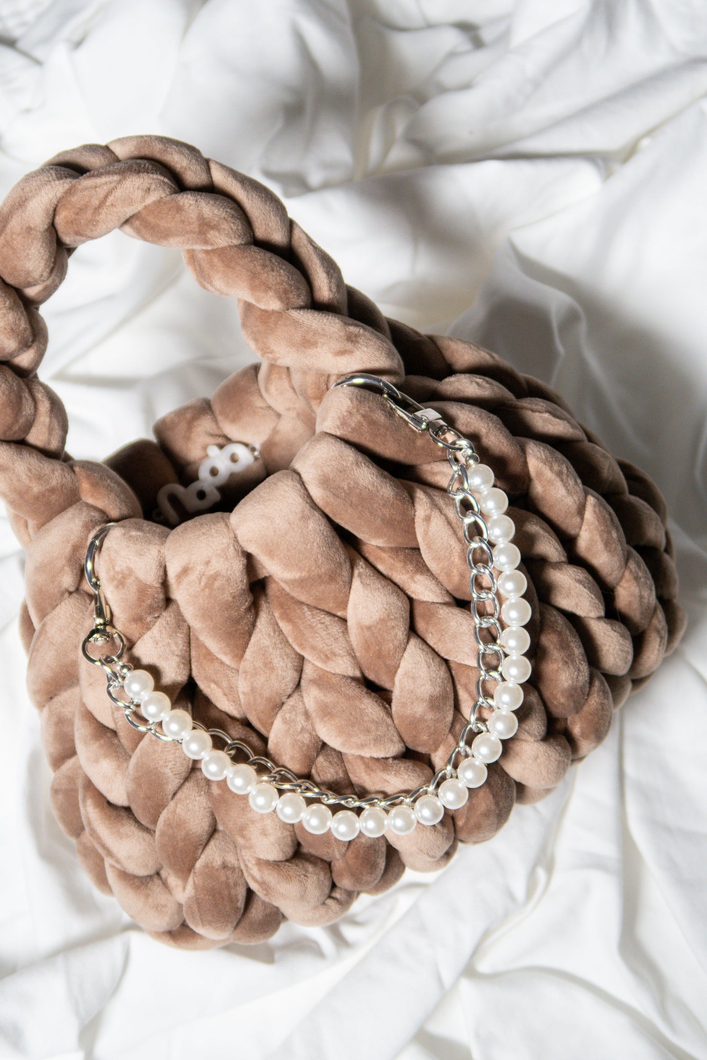 Silver design with pearls